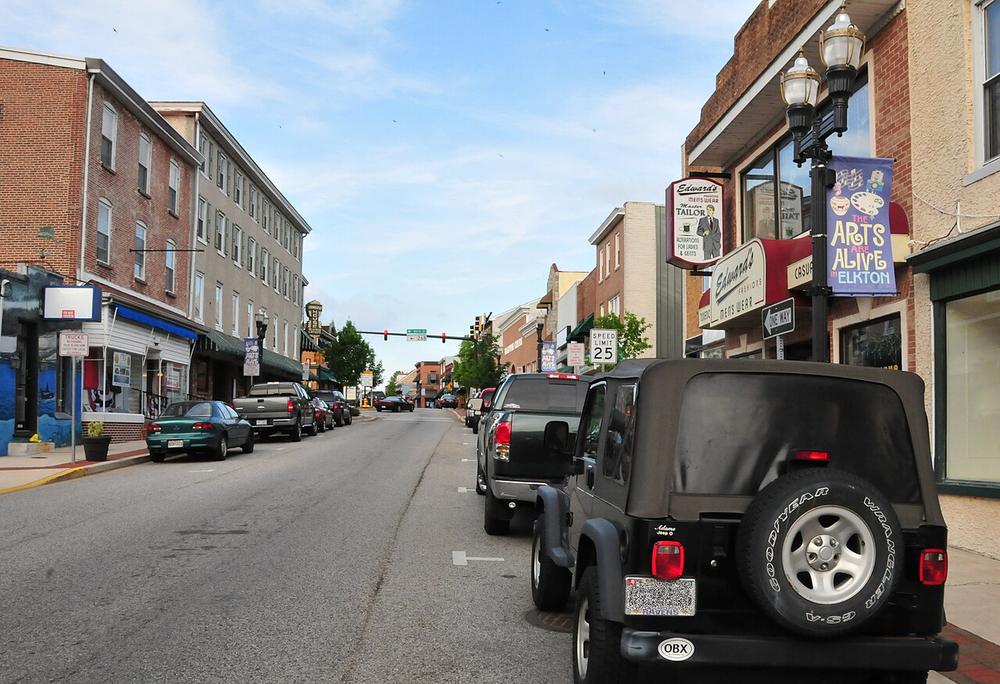 Main Street in Elkton in 2009, with brick storefronts and parked cars
